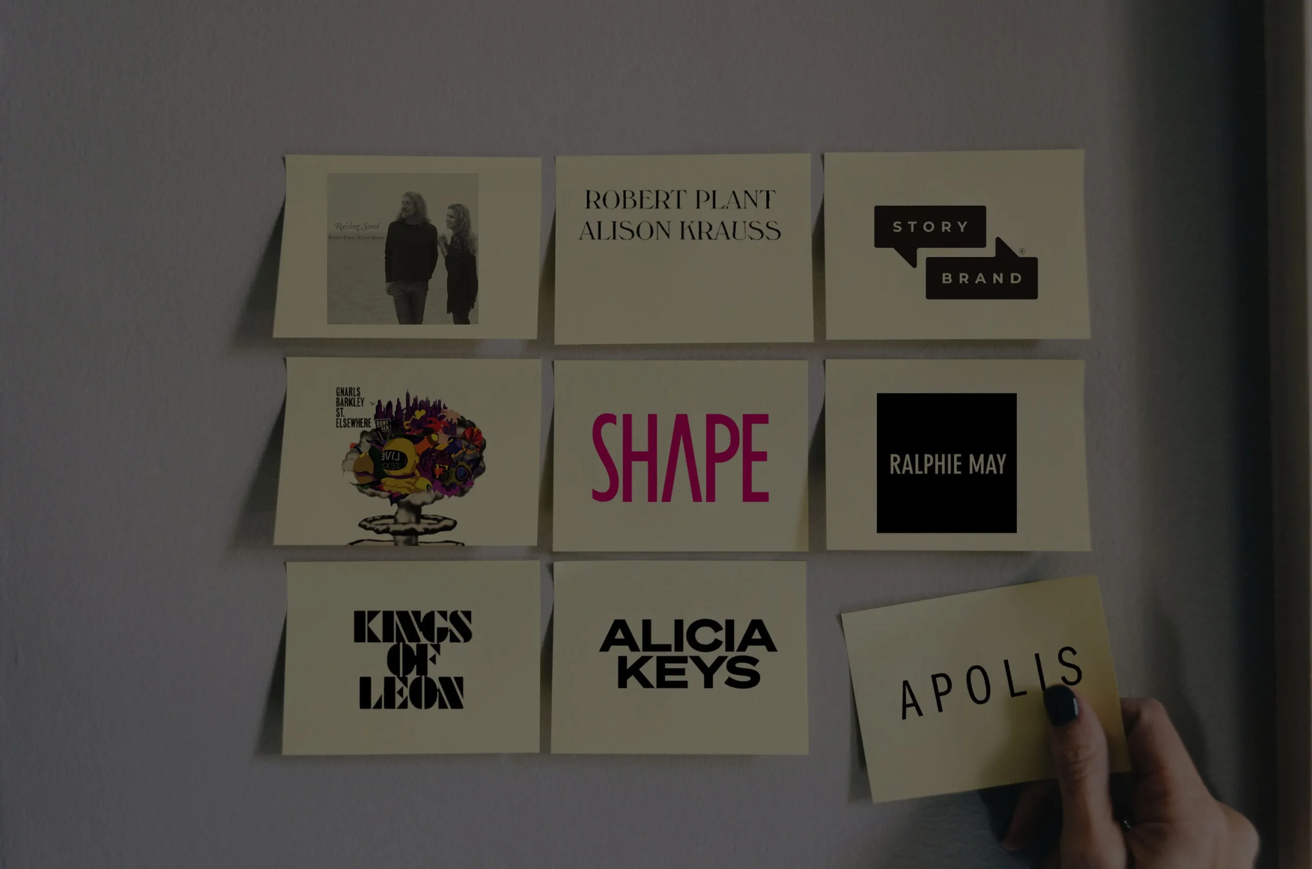 Wall of sticky notes featuring logos of StoryBrand, Alicia Keys, Kings of Leon, Apolis, and other Waterloo Digital clients